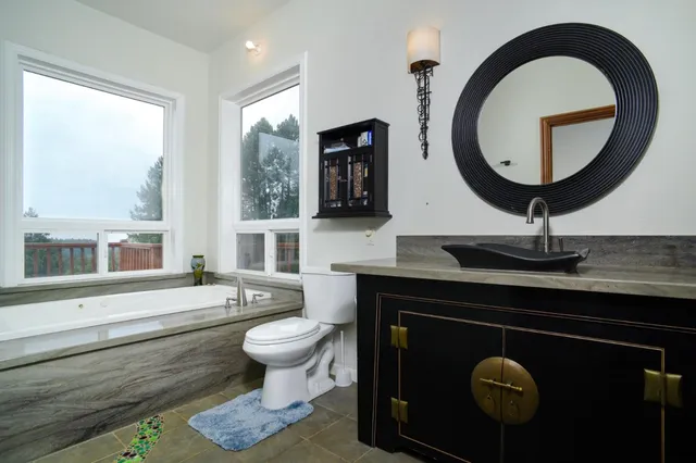 a bedroom with a bed and a walk in closet