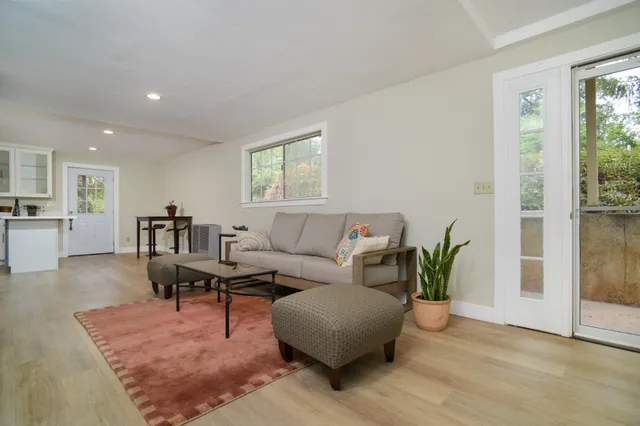 a kitchen with a stove and a refrigerator