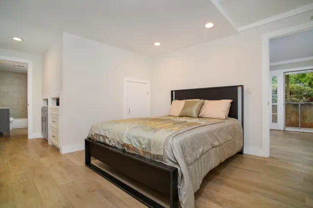 a view of a wooden deck with a patio