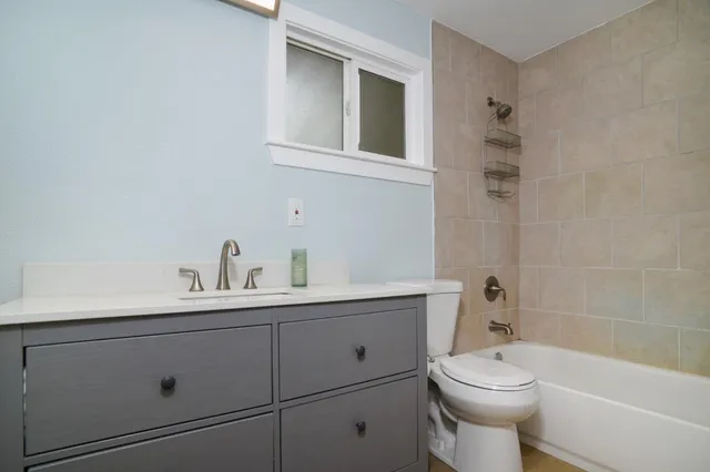 a aerial view of a house with swimming pool