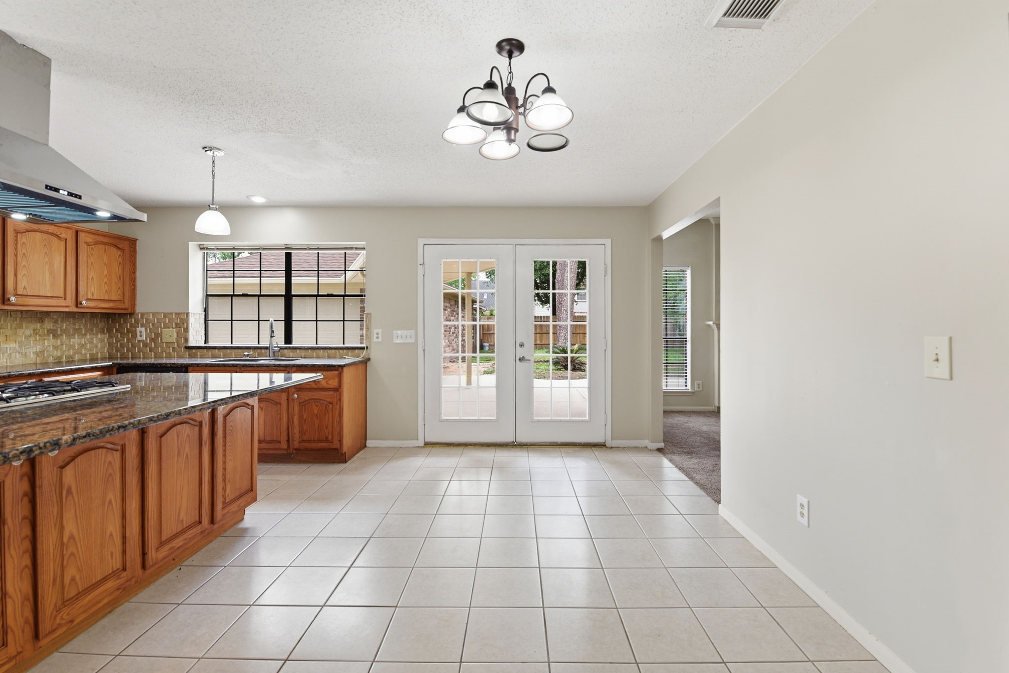 2726 Alderleaf Place Spring, TX 77388 - Photo 16 of 36 Light Bright Breakfast Open to backyard