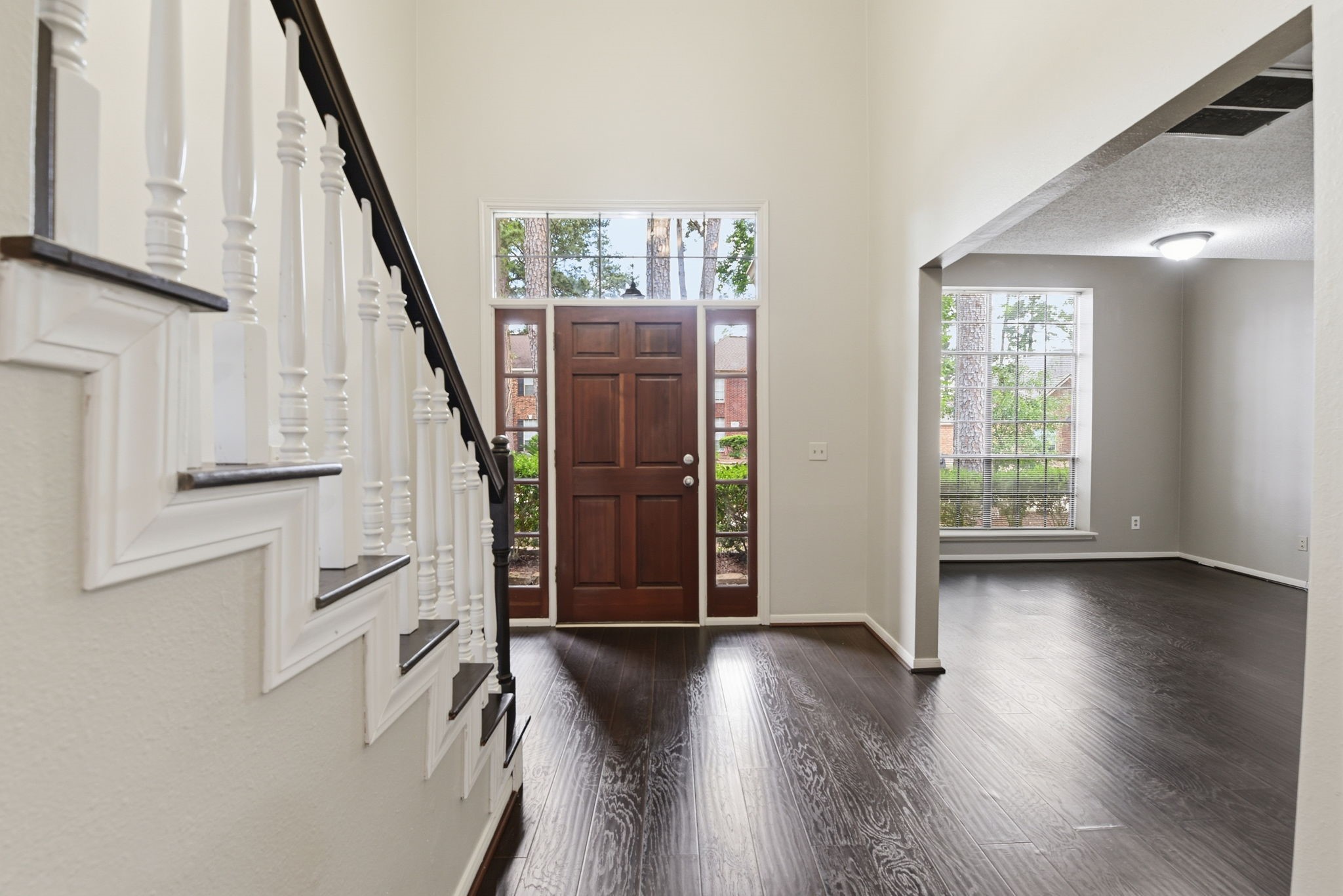 2726 Alderleaf Place Spring, TX 77388 - Photo 5 of 36 Rich Wood Laminate Floors in Dining, Entry, Study