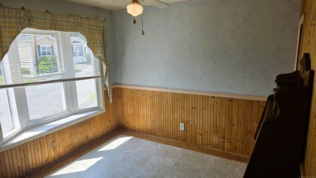 view of an empty room with a window