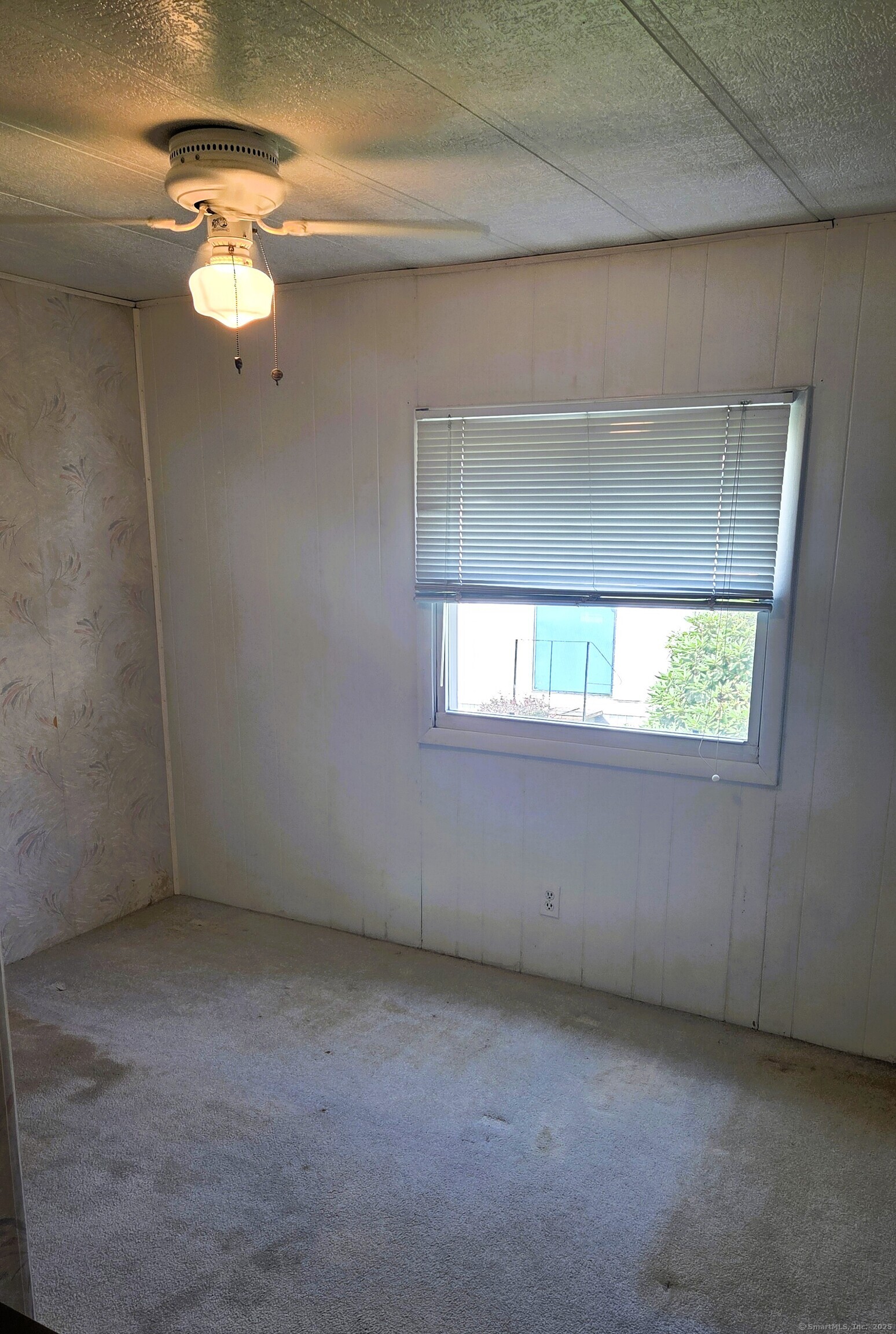 301 South Main Street Newtown, CT 06470 - Photo 8 of 11 a view of a window in an empty room