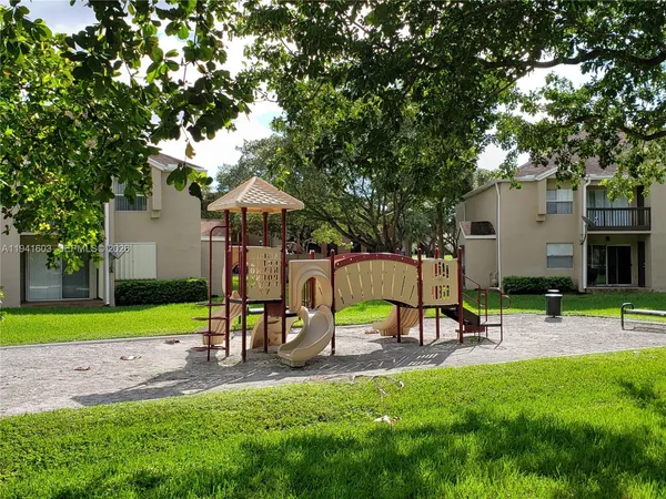 a view of a park with slide