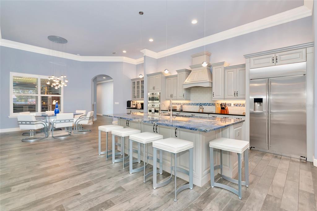 28154 Gopher Hill Road Myakka City, FL 34251 - Photo 4 of 100 a kitchen with a table and chairs