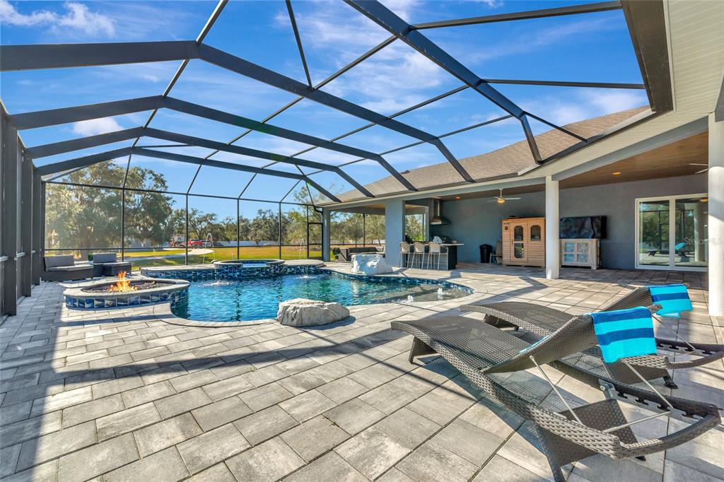 28154 Gopher Hill Road Myakka City, FL 34251 - Photo 5 of 100 a view of swimming pool with lounge chair