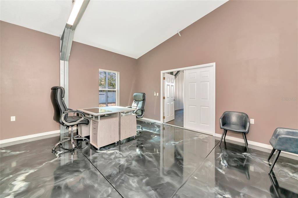 28154 Gopher Hill Road Myakka City, FL 34251 - Photo 62 of 100 a room with furniture and a chair