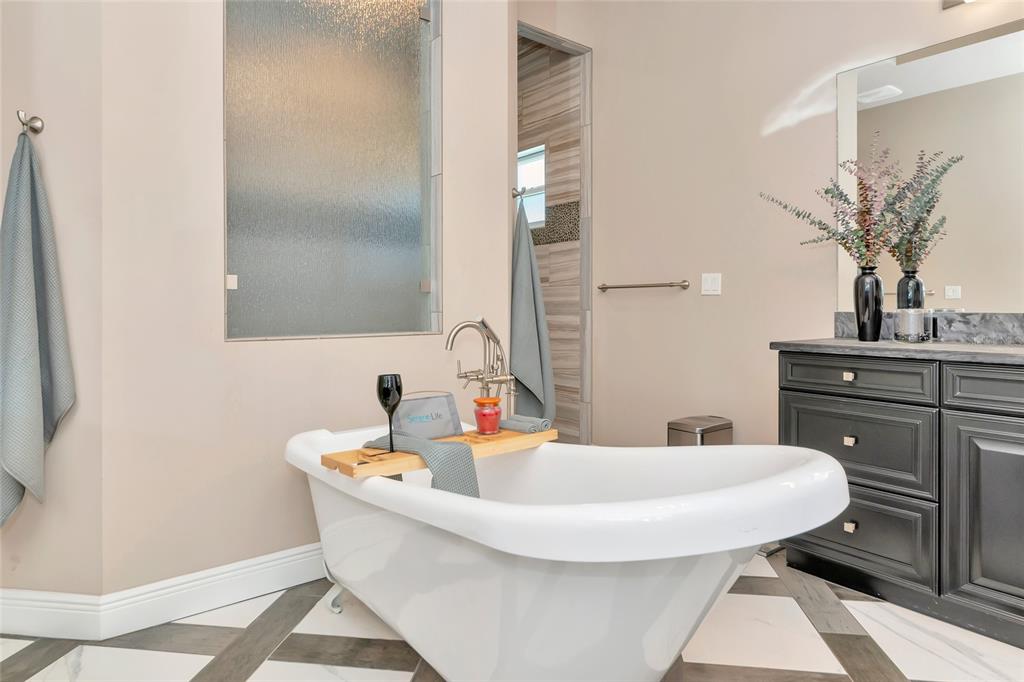 28154 Gopher Hill Road Myakka City, FL 34251 - Photo 74 of 100 a bathroom with a sink and a mirror