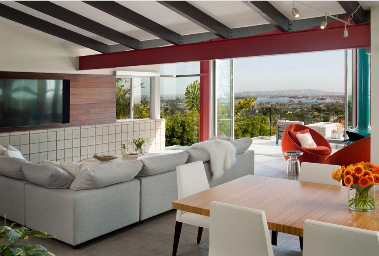 5038 Windsor Drive Pacific Beach, CA 92109 - Photo 13 of 33 a living room with furniture and a floor to ceiling window