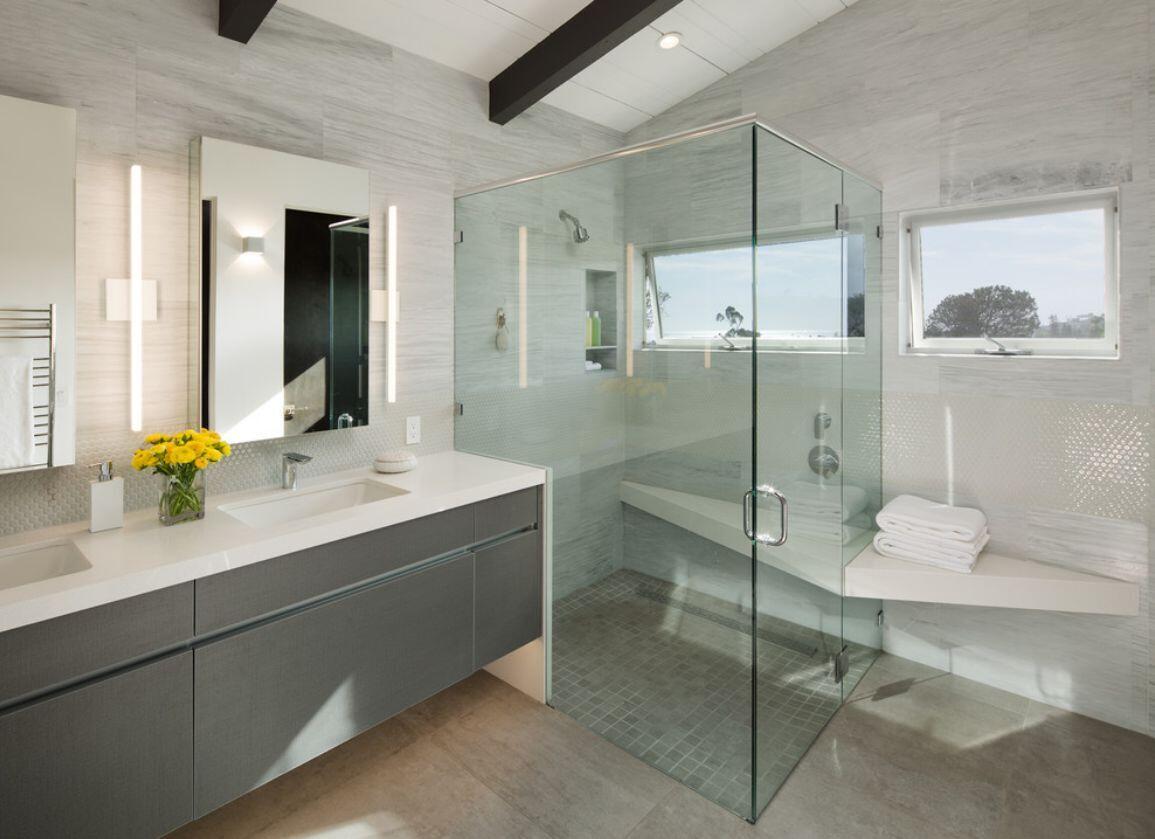 5038 Windsor Drive Pacific Beach, CA 92109 - Photo 16 of 33 a bathroom with a shower sink and mirror