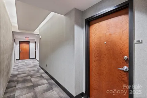 a view of hallway with a large window