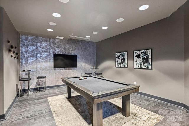 a living room with a couch and a flat screen tv