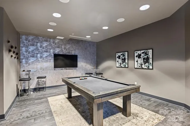 a living room with a couch and a flat screen tv