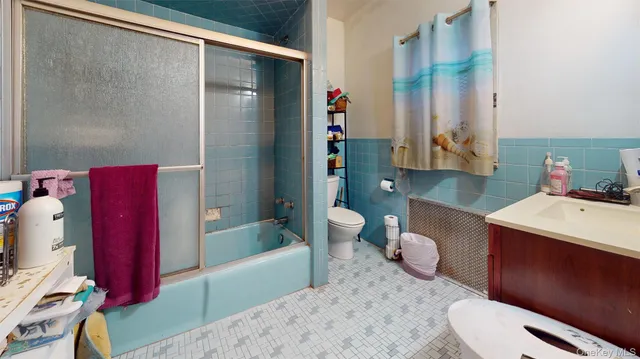 a room with furniture and wooden floor