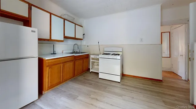 a picture of a bathroom with a shower