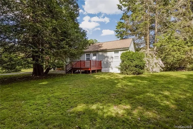 a view of a house with a garden