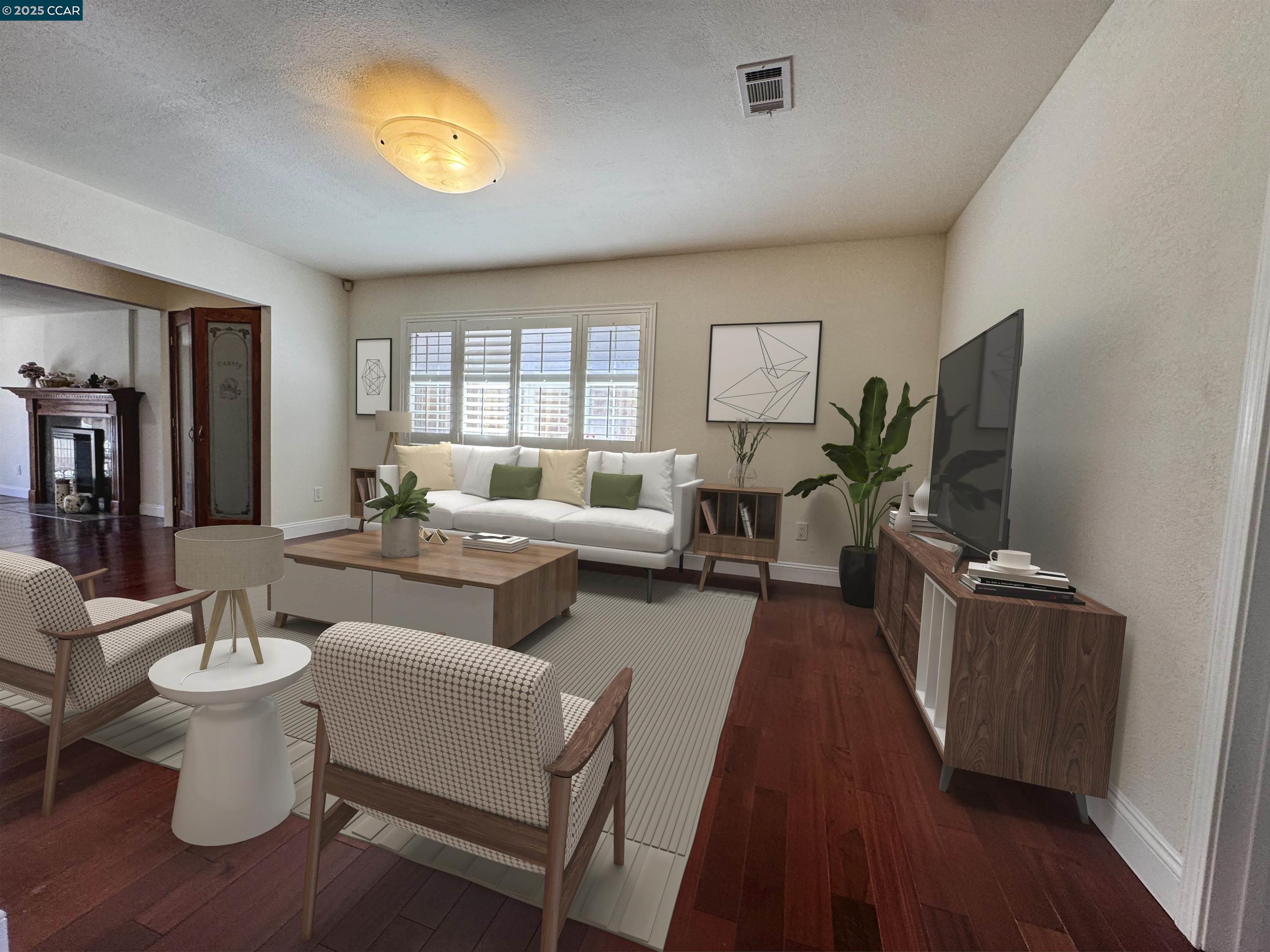 404 Coral Reef Road Alameda, CA 94501 - Photo 17 of 33 a living room with furniture a chandelier and a flat screen tv