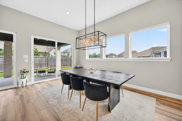 a kitchen with stainless steel appliances granite countertop a sink a microwave counter space and cabinets
