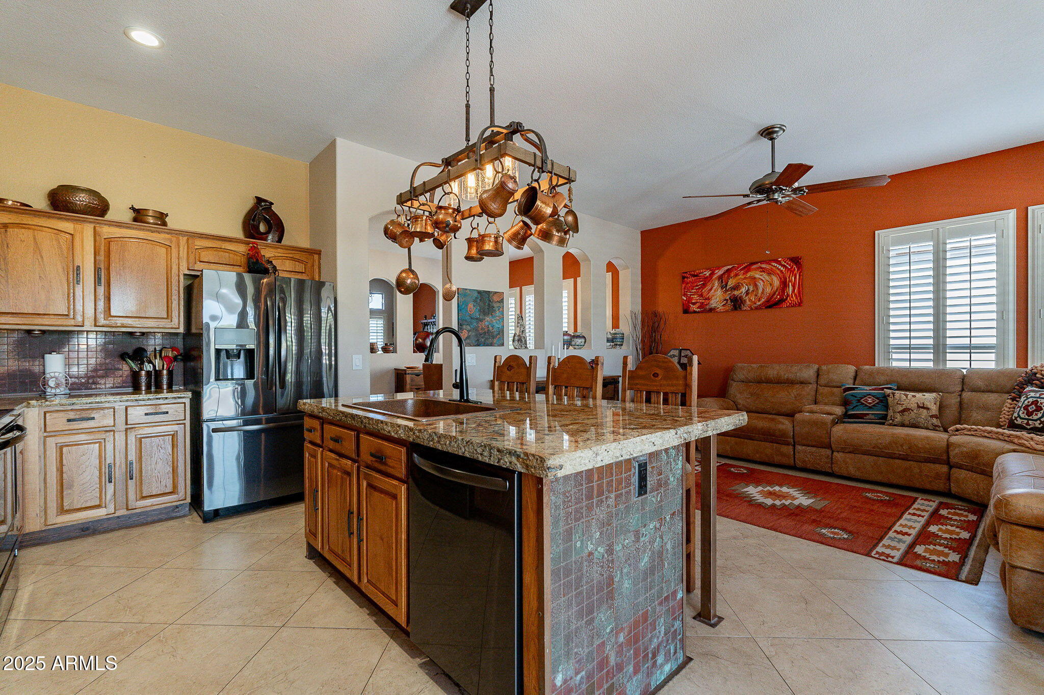 4333 South Pony Rider Trail Gold Canyon, AZ 85118 - Photo 19 of 54 a kitchen with stainless steel appliances granite countertop a stove and a sink