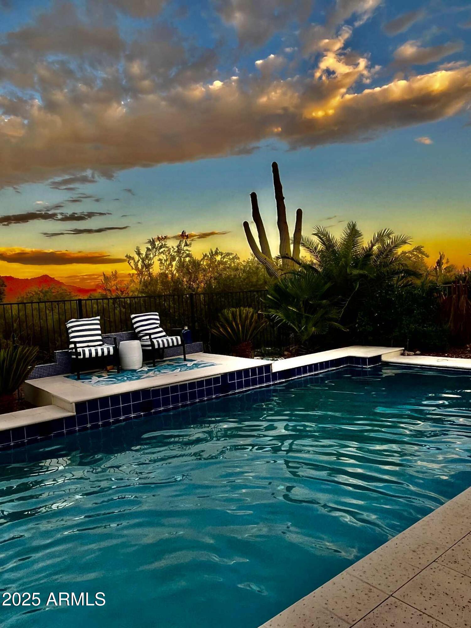 4333 South Pony Rider Trail Gold Canyon, AZ 85118 - Photo 2 of 54 a view of a swimming pool with a yard