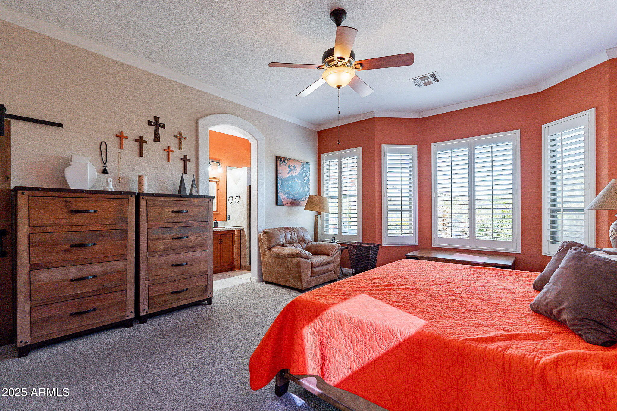 4333 South Pony Rider Trail Gold Canyon, AZ 85118 - Photo 30 of 54 a bedroom with a bed and a chandelier