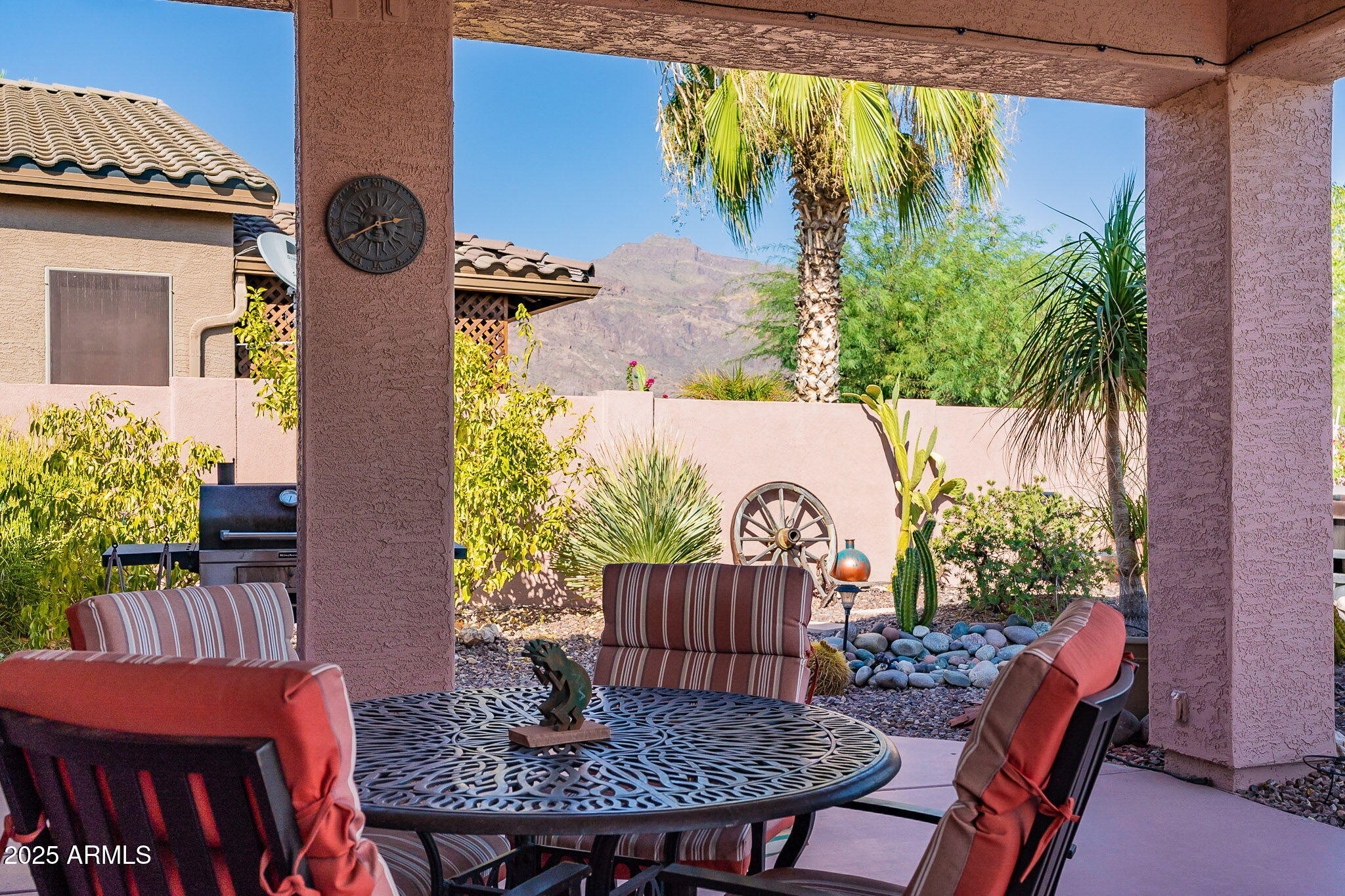 4333 South Pony Rider Trail Gold Canyon, AZ 85118 - Photo 42 of 54 a view of a chairs and table in the patio