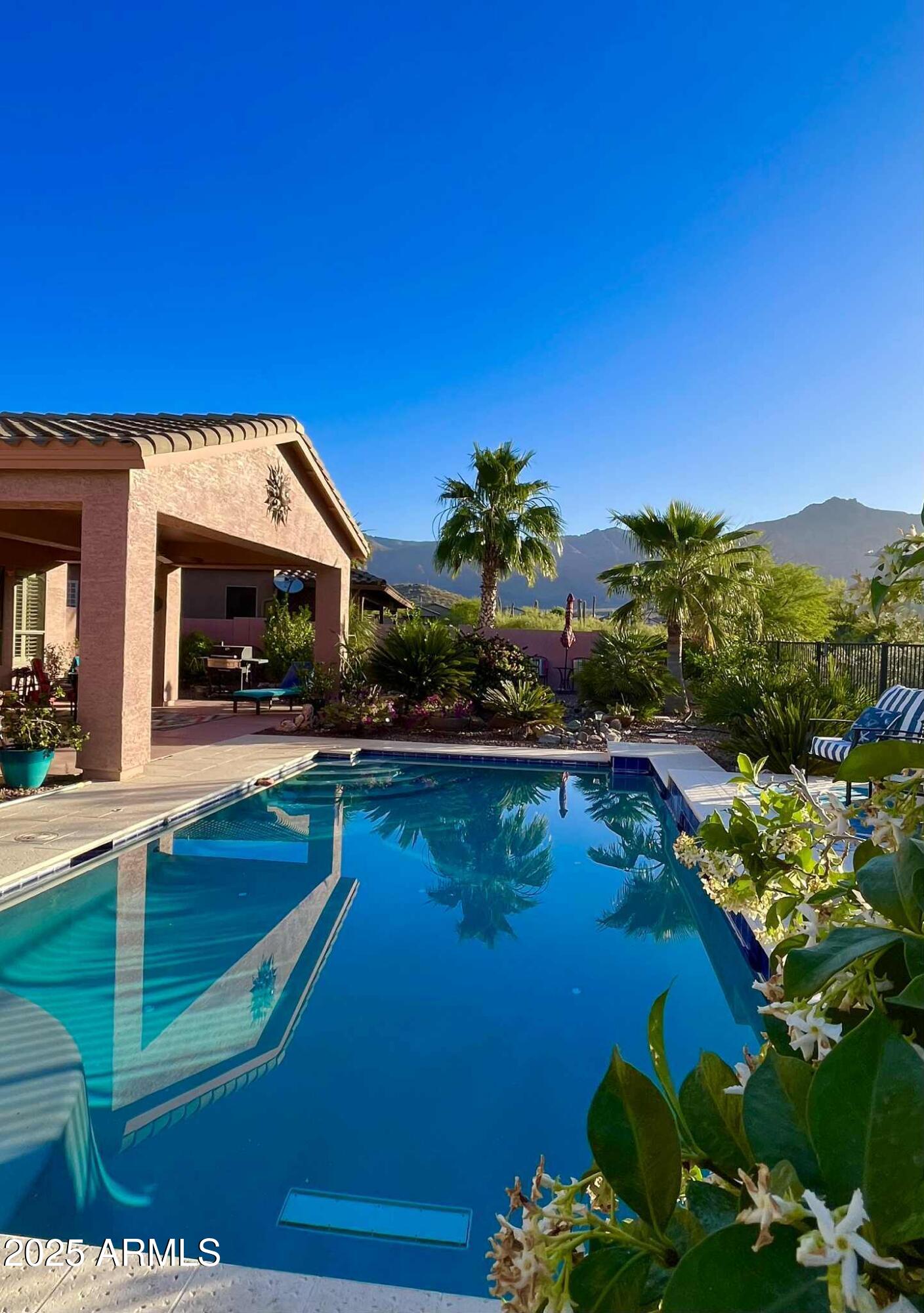 4333 South Pony Rider Trail Gold Canyon, AZ 85118 - Photo 50 of 54 a view of a house with a swimming pool