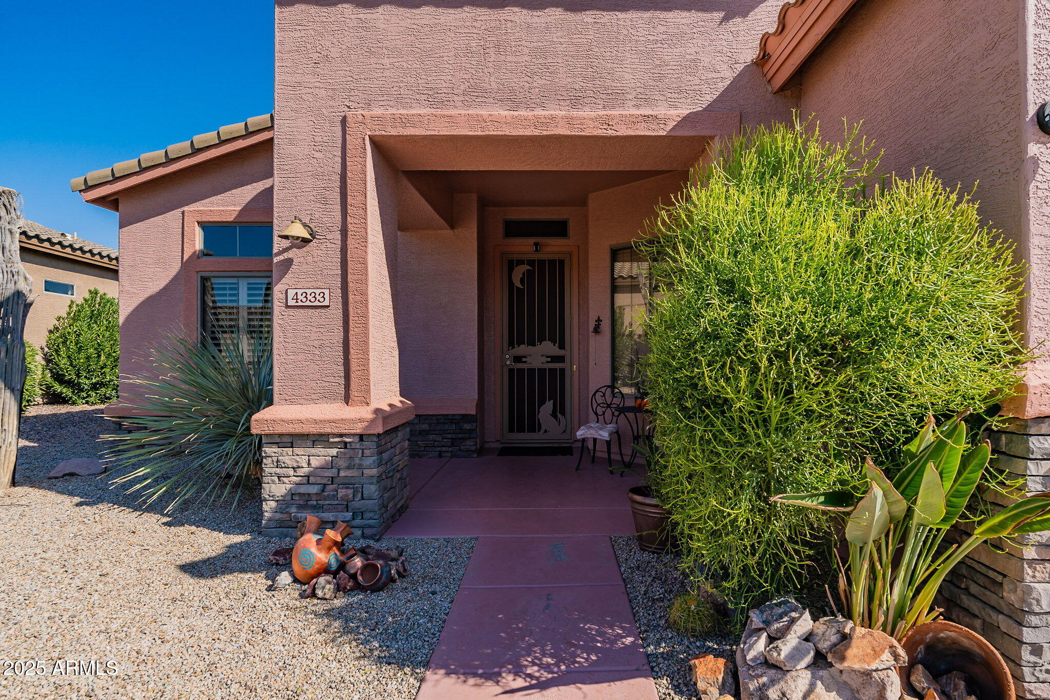 4333 South Pony Rider Trail Gold Canyon, AZ 85118 - Photo 10 of 54 a front view of a house with garden