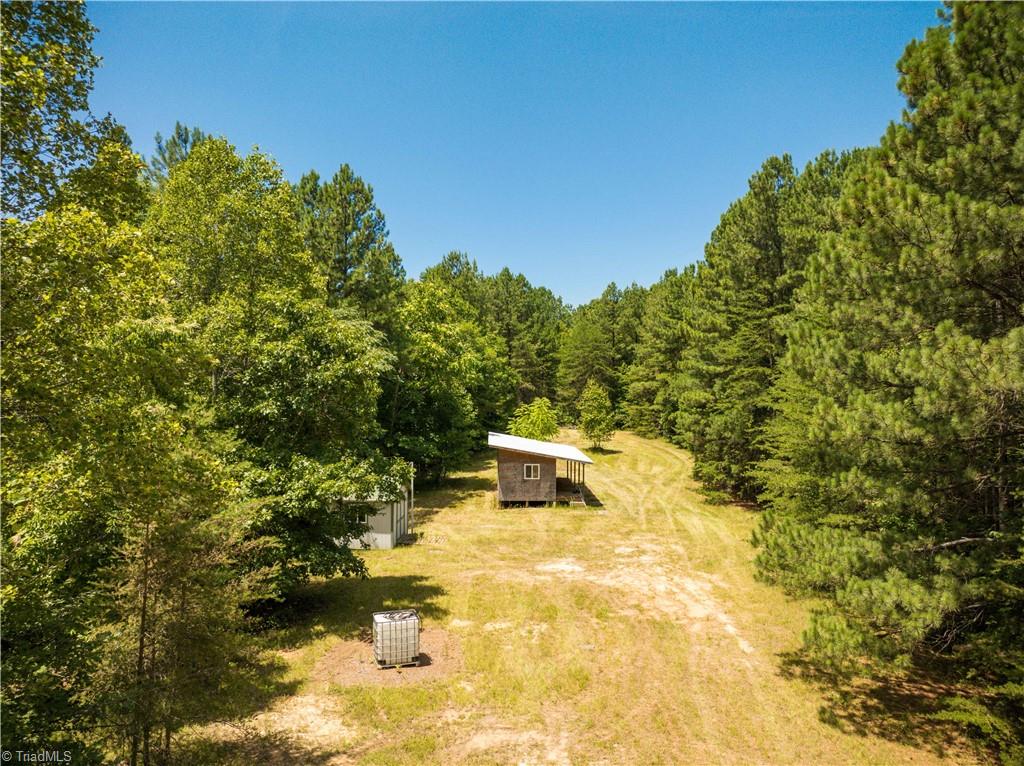1230 Delta Acres Road Sandy Ridge, NC 27046 - Photo 6 of 46 Hunting cabins and field.