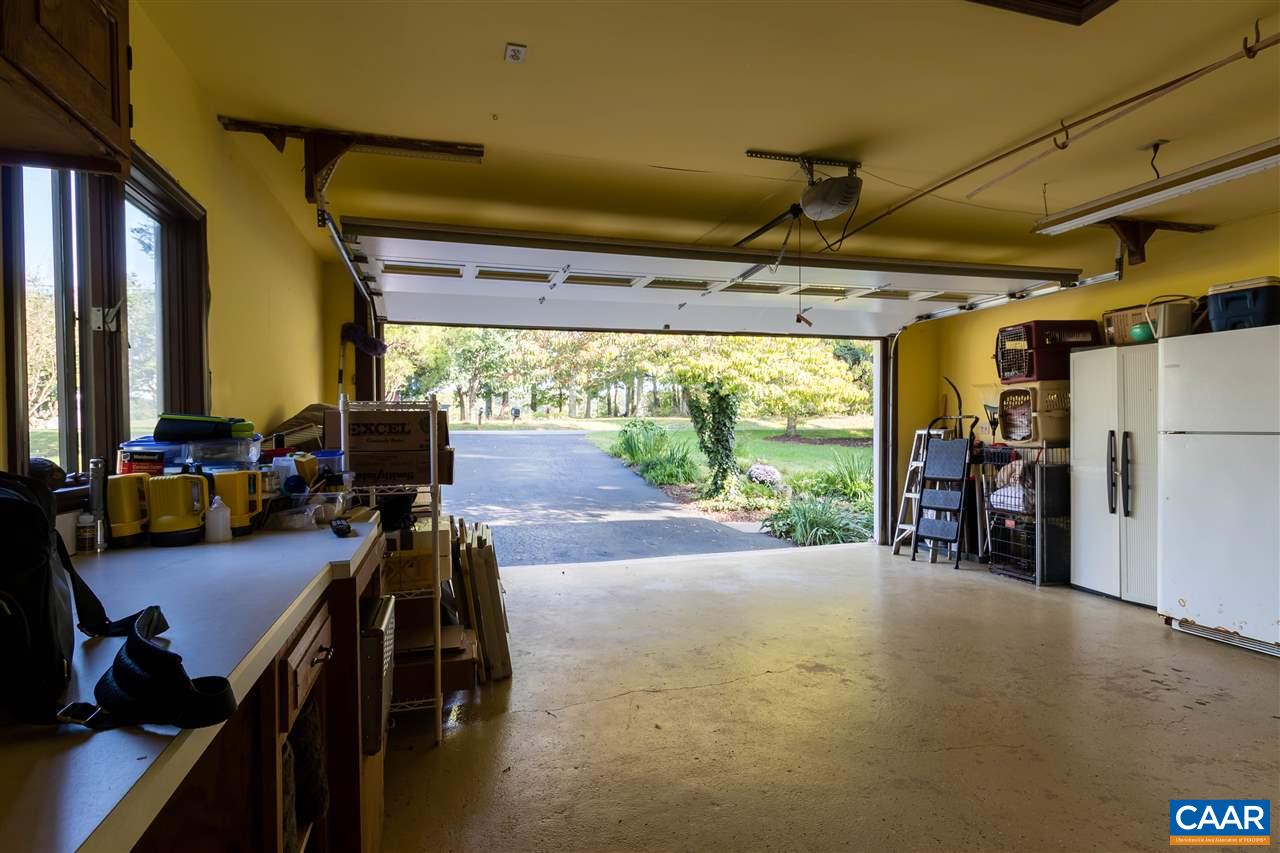 1655 Swift Run Road Ruckersville, VA 22968 - Photo 22 of 32 a view of a room with gym equipment