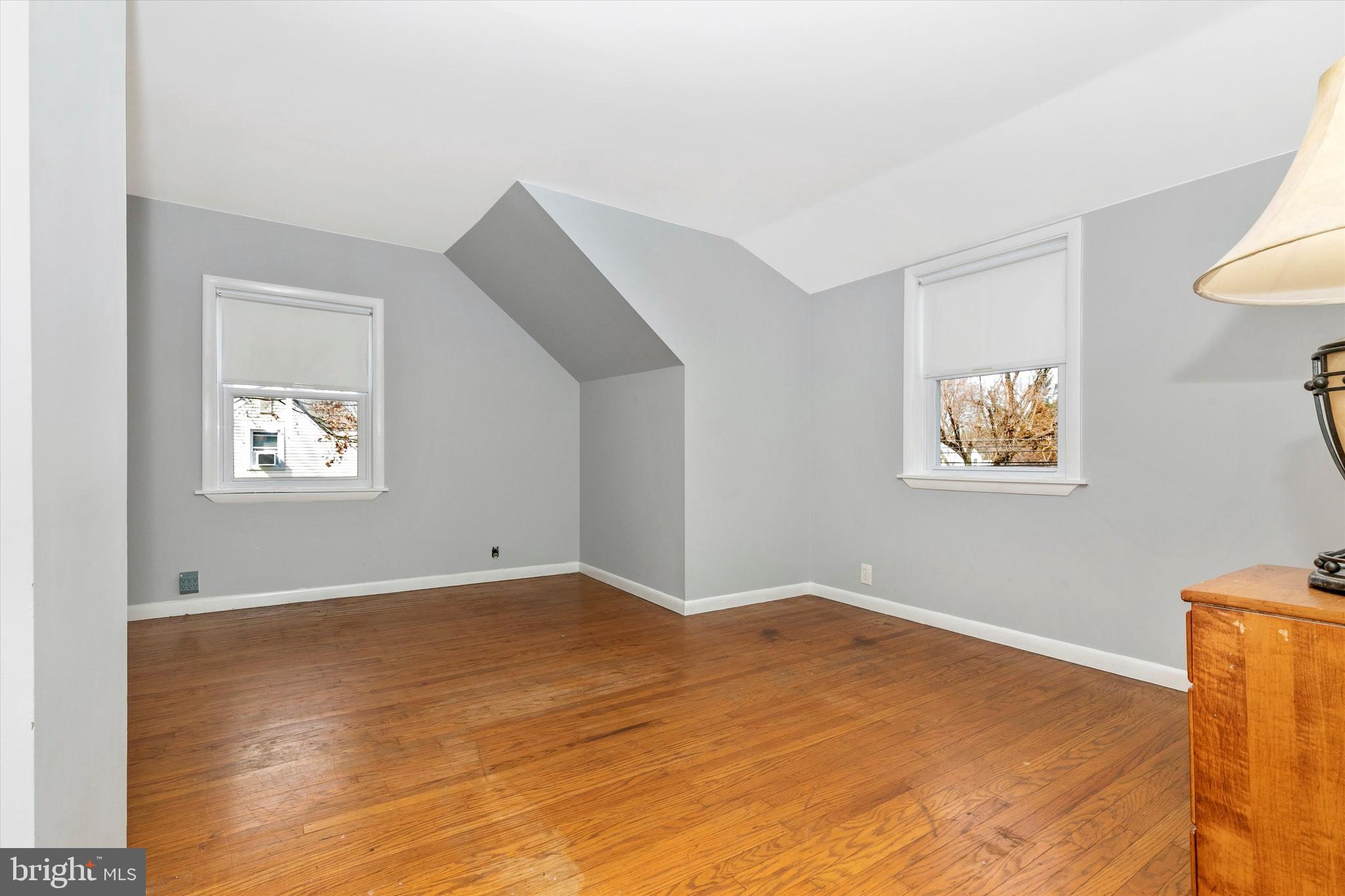 1502 Church Road Oreland, PA 19075 - Photo 19 of 39 a view of empty room with wooden floor