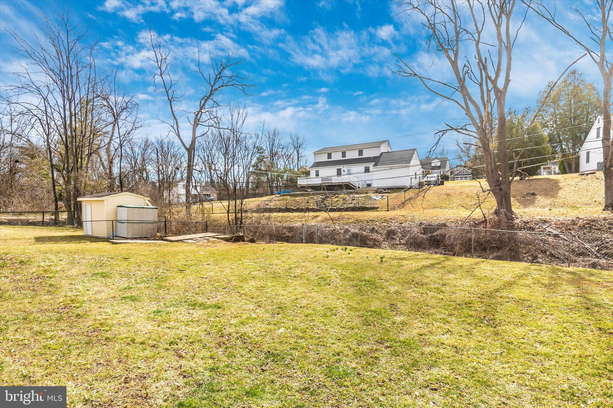 1502 Church Road Oreland, PA 19075 - Photo 38 of 39 a house with trees in front of it