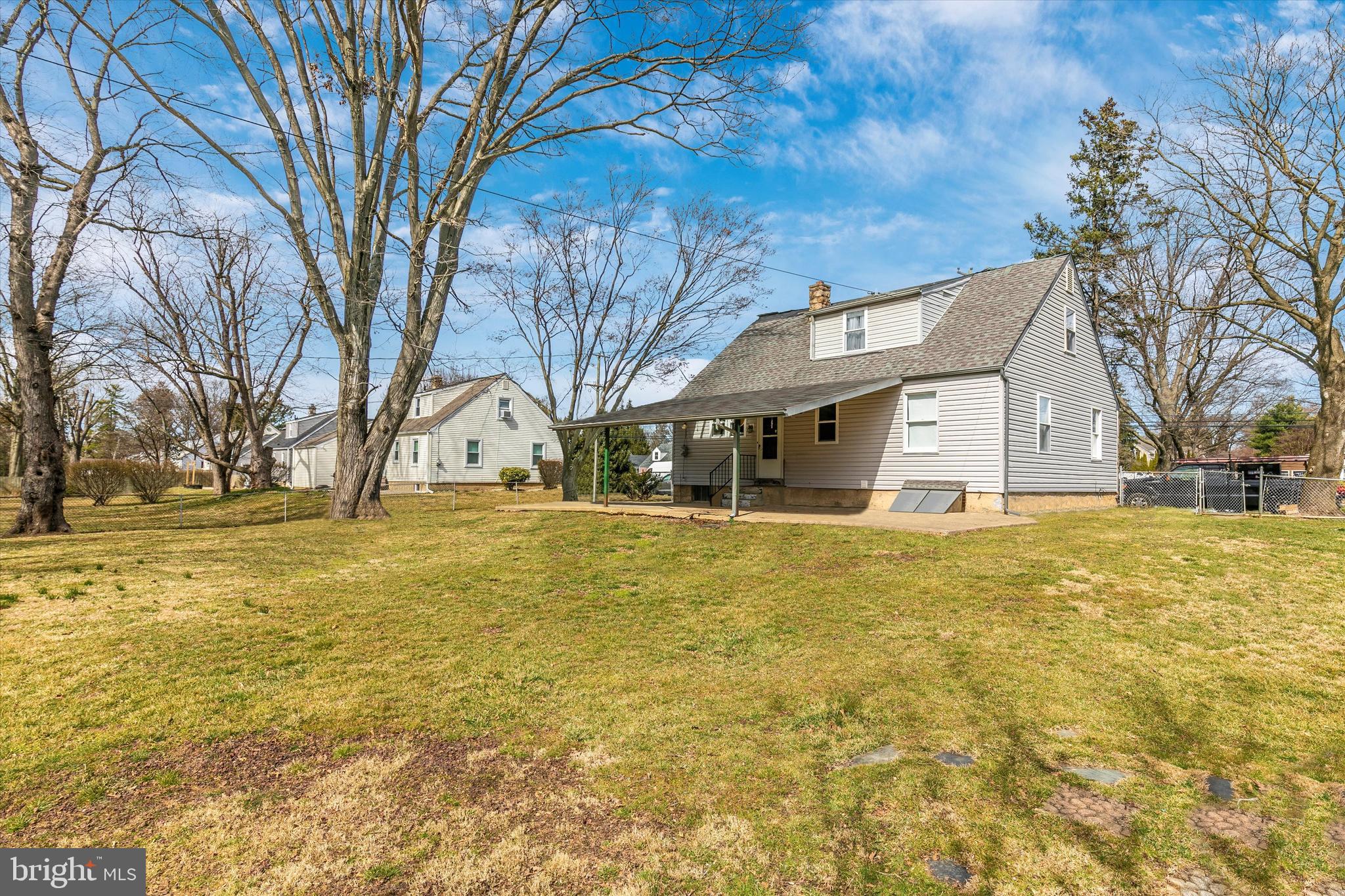 1502 Church Road Oreland, PA 19075 - Photo 39 of 39 a front view of house with large trees