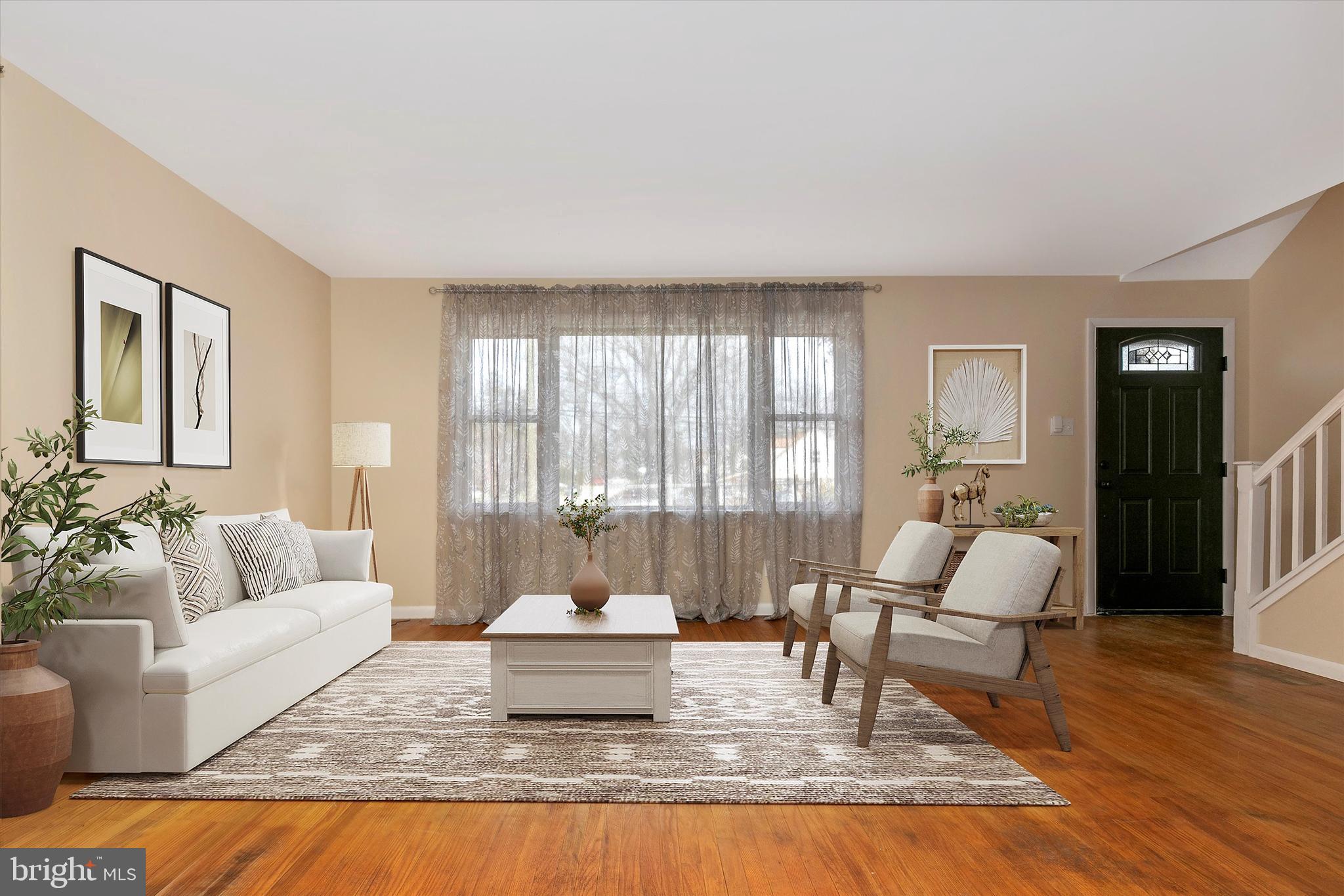 1502 Church Road Oreland, PA 19075 - Photo 5 of 39 a living room with furniture and wooden floor