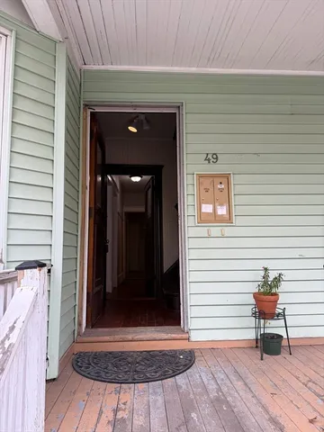 a view of a door and a window in a house