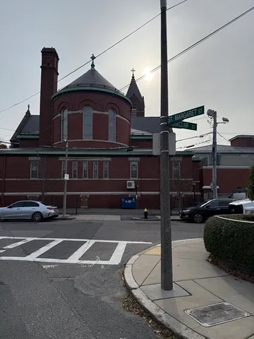 a view of a car park in front of house