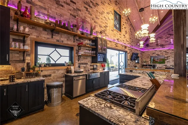 a view of a chairs and table in the patio