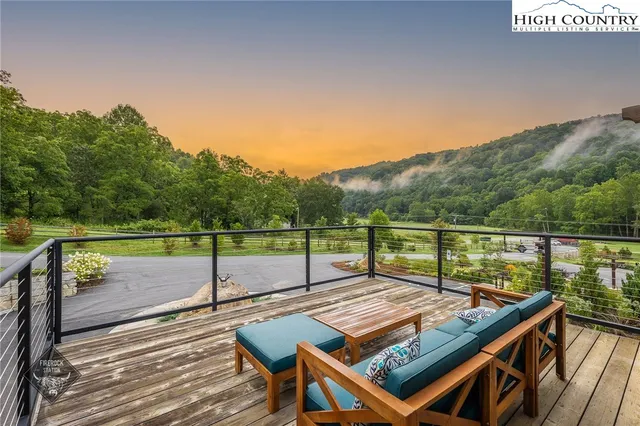 a view of a chairs and table in patio