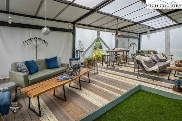 a view of porch with seating area