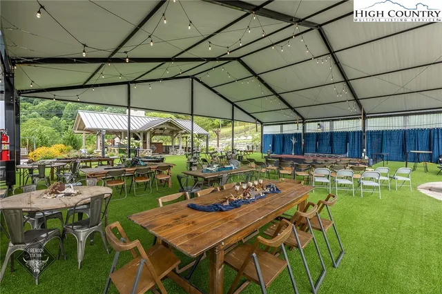 a view of a swimming pool with a patio