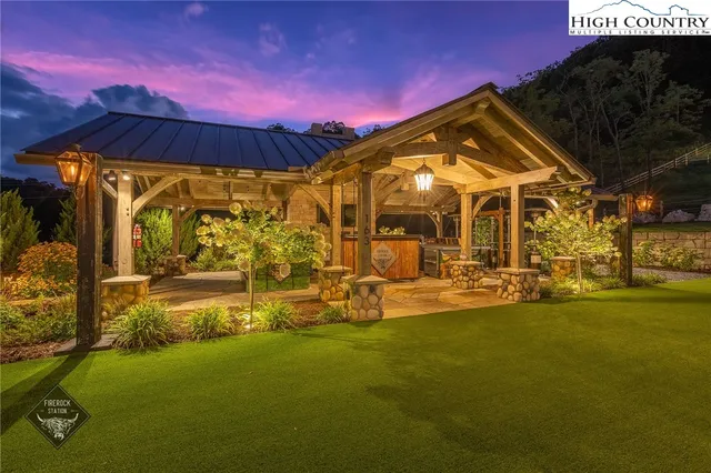 a view of a chairs and table in a patio