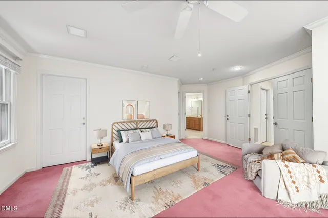 a utility room with cabinets washer and dryer