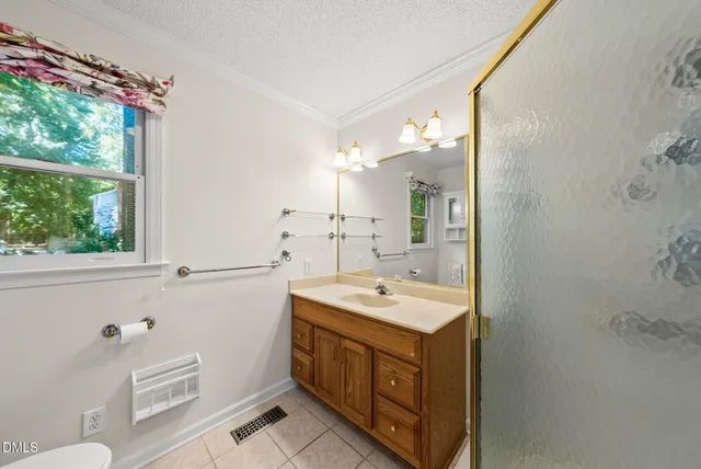 a bedroom with furniture and a wooden floor