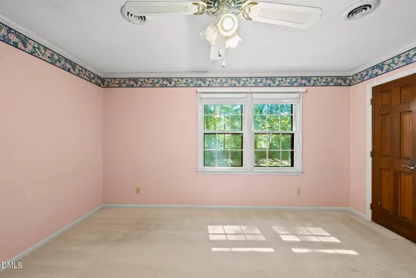 a view of a room with a large window