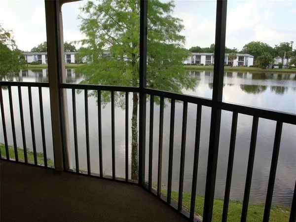 a view of a lake from a balcony