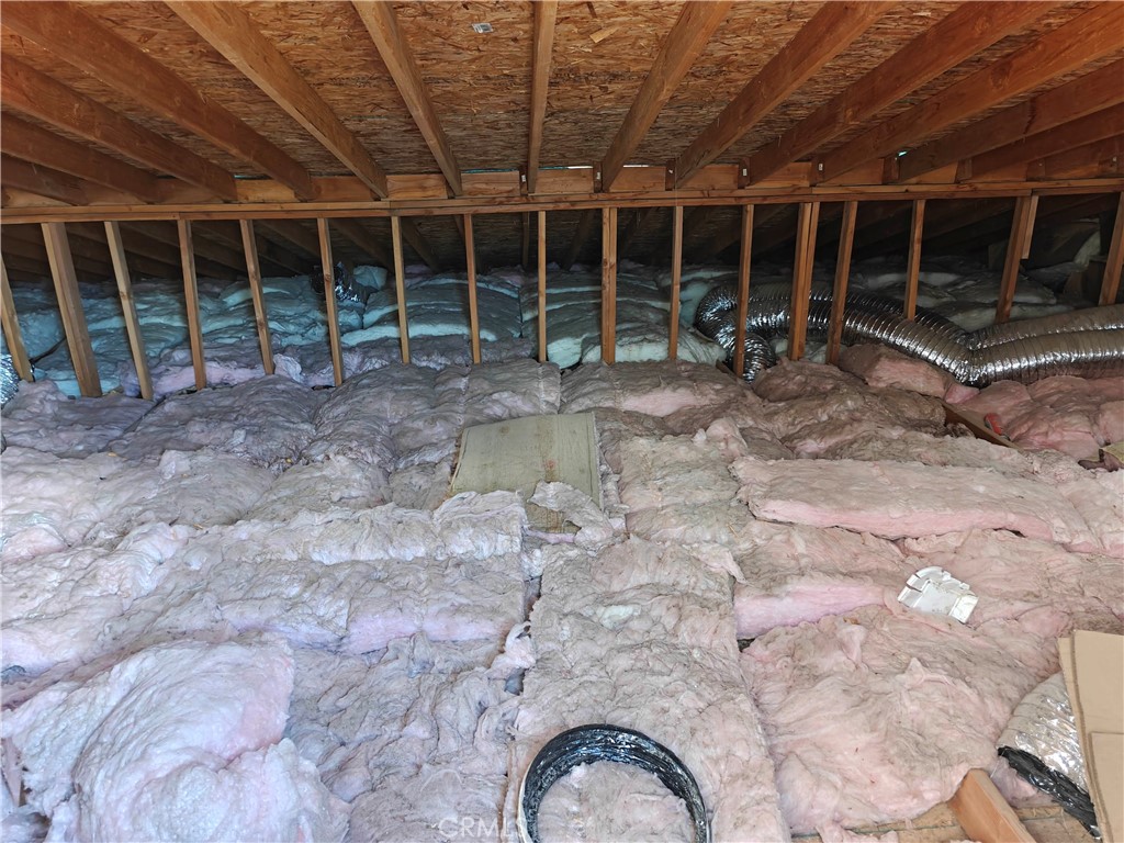 31576 Emerald Road Lucerne Valley, CA 92356 - Photo 36 of 44 a view of a room with wooden walls