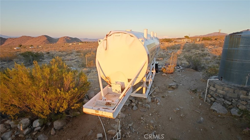 31576 Emerald Road Lucerne Valley, CA 92356 - Photo 10 of 44 an aerial view of a backyard with swimming pool