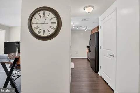 a view of a hallway with front door