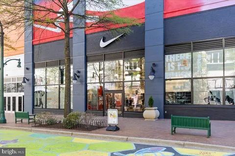 a view of a building with sitting area